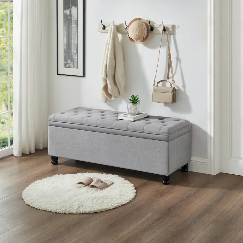 Panca pouf contenitore con rivestimento trapuntato e vano contenitore nascosto