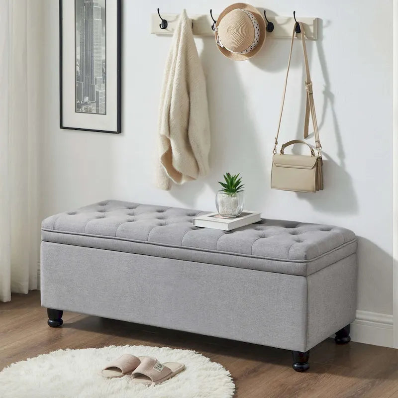 Panca pouf contenitore con rivestimento trapuntato e vano contenitore nascosto